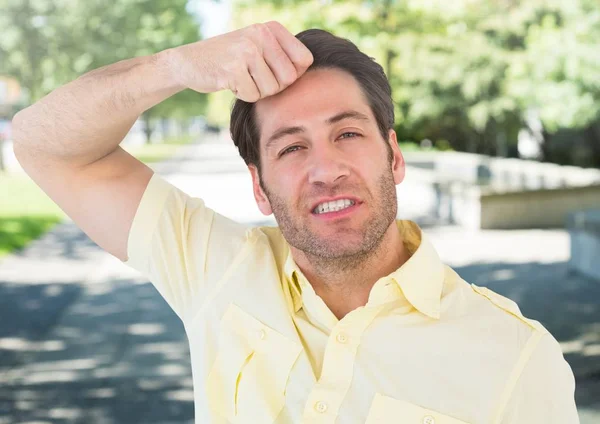 Stressed man in park — Stock Photo, Image