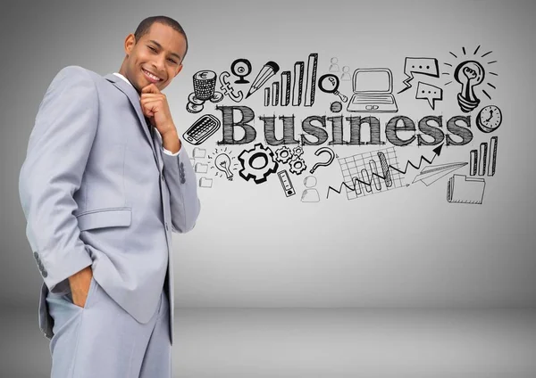 Empresário com desenhos gráficos de negócios — Fotografia de Stock