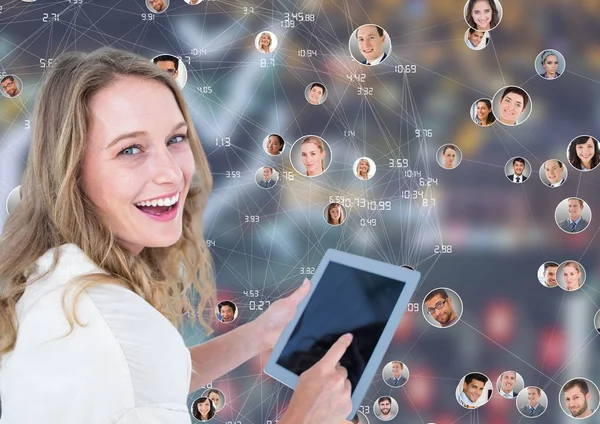 Girl with tablet against Night city with connectors — Stock Photo, Image