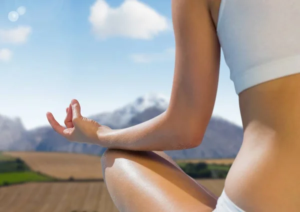 Woman Meditating by mountains — Stock Photo, Image