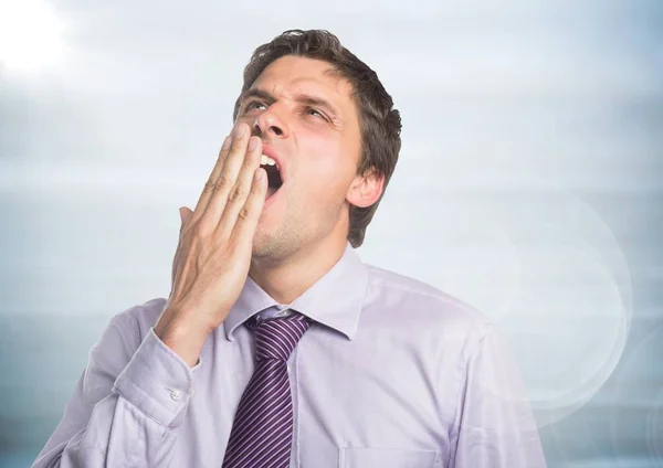 Close up of man in lavender shirt yawning — Stock Photo, Image