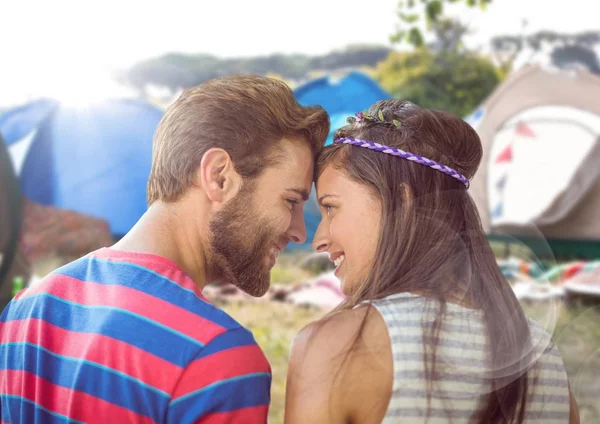 Hippie couple in campsite with flare — Stock Photo, Image