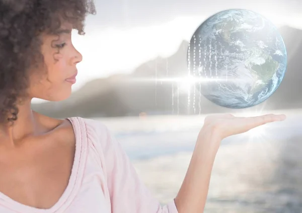 Woman with open palm hand holding world earth globe interface — Stock Photo, Image