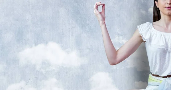 Woman Meditating peaceful by cloud wall — Stock Photo, Image