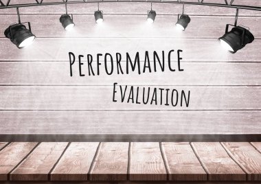 Performance evaluation text with spotlights on wood clipart