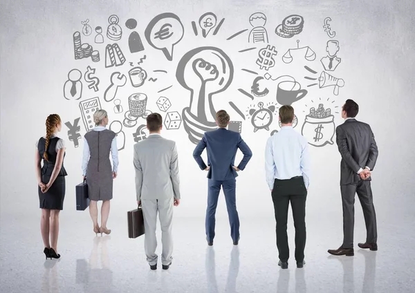 Business people group looking at business graphic drawings — Stock Photo, Image