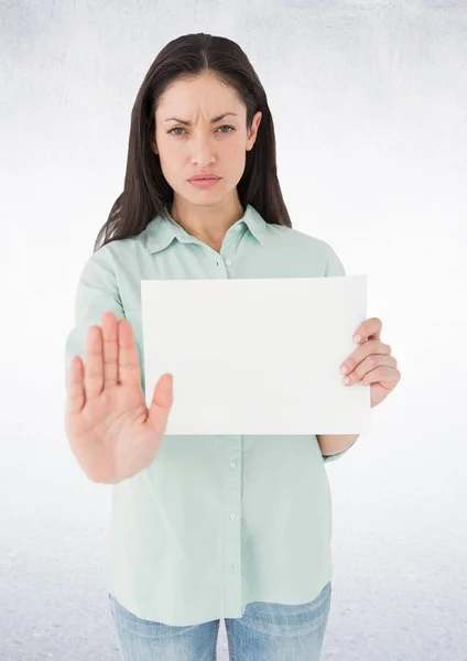 Woman with blank card holding out hand against white background — Stock Photo, Image