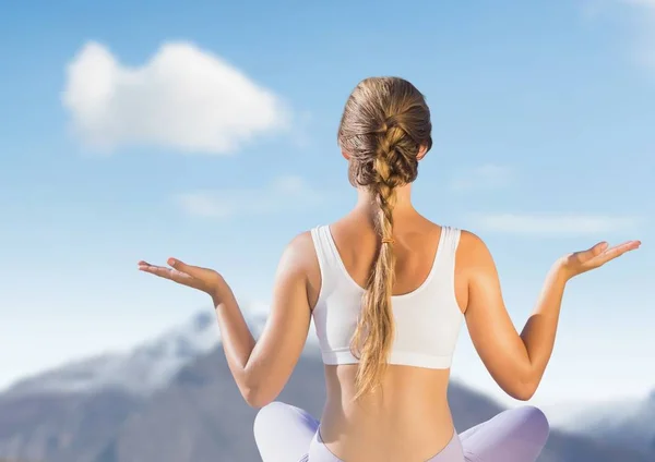 Woman Meditating by mountains — Stock Photo, Image