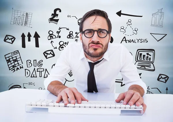 Man at desk against black business doodles — Stock Photo, Image