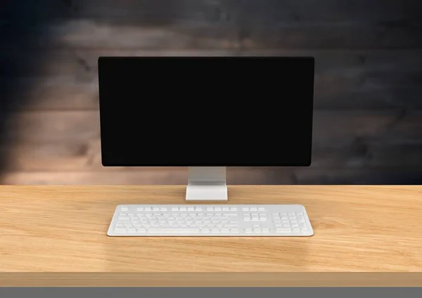 Computer tegen wazig houten paneel — Stockfoto