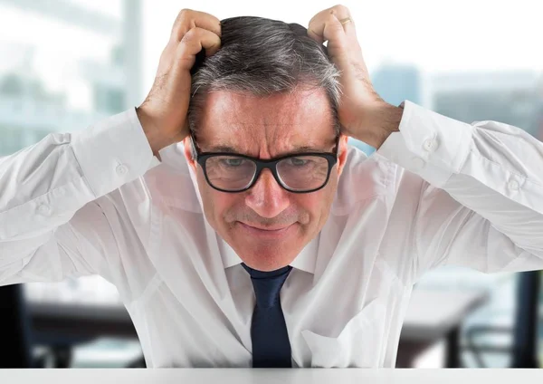 Stressed man in office