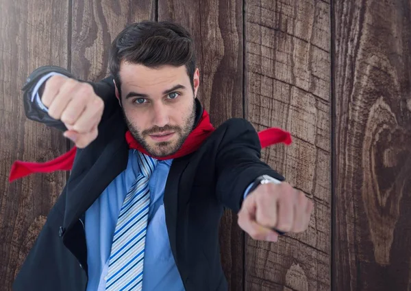 Business Superhero against wood — Stock Photo, Image