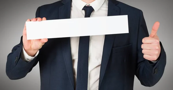 Uomo d'affari busto con carta bianca ahd pollici contro sfondo grigio — Foto Stock