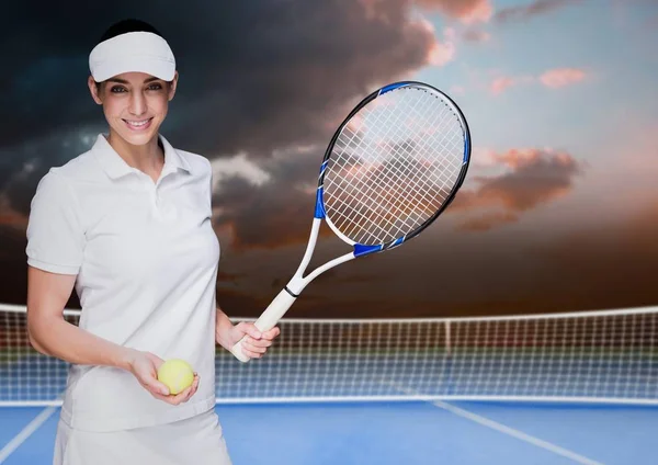 Tennis player on court with evening sky — Stock Photo, Image