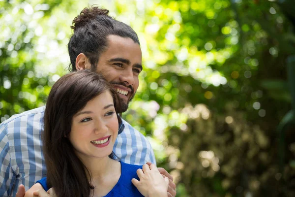 Romantic young couple in park — Stock Photo, Image