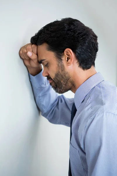 Stressed businessman at conference centre — Stock Photo, Image