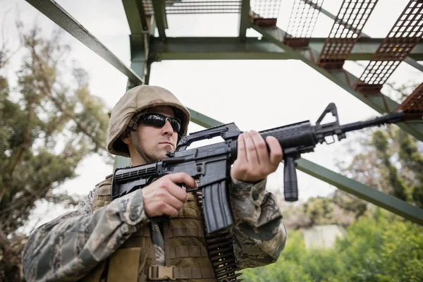 Military soldier guarding with a rifle — Stock Photo, Image