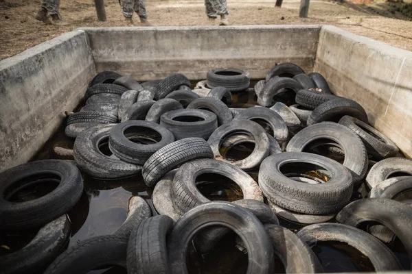 Boot camp with tires obstacle course — Stock Photo, Image