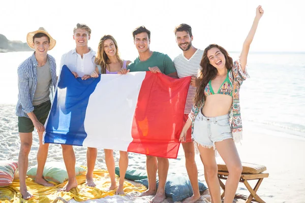 Amigos con bandera francesa — Foto de Stock