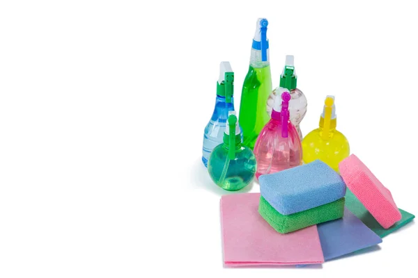 Colorful spray bottles with sponges — Stock Photo, Image