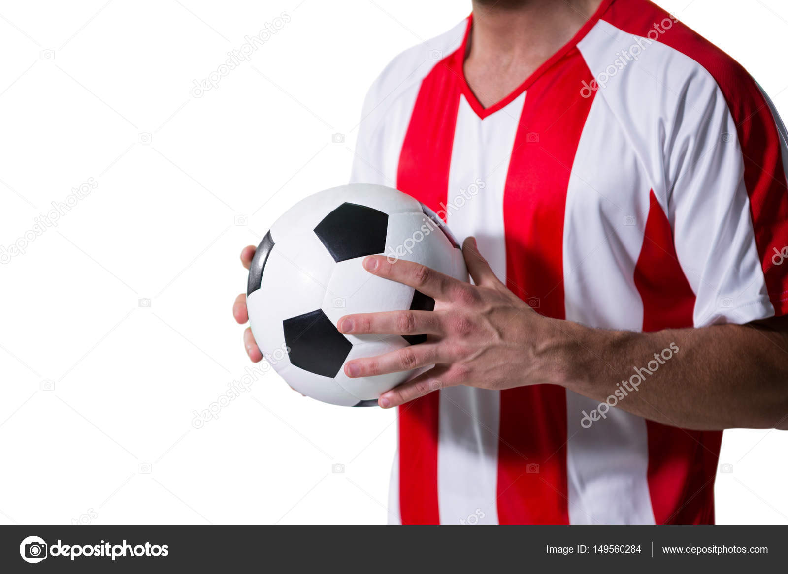 Football Player Holding Football With Both Hands Stock Photo