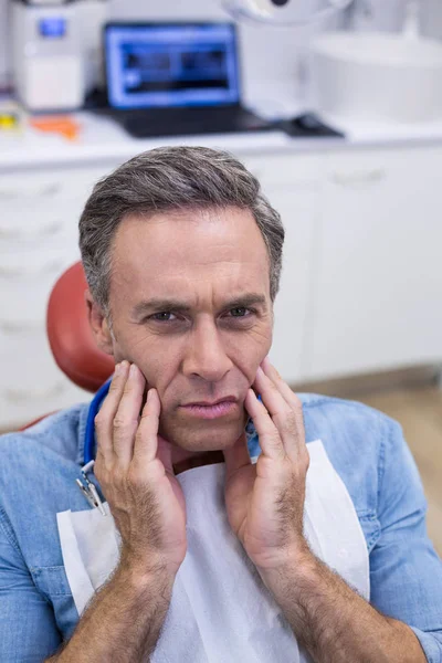 Unhappy man having a toothache — Stock Photo, Image