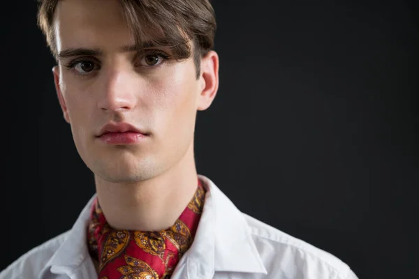 Androgynous man in muffler posing — Stock Photo, Image