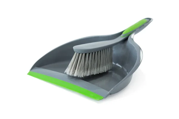 Close-up of gray dustpan with brush — Stock Photo, Image