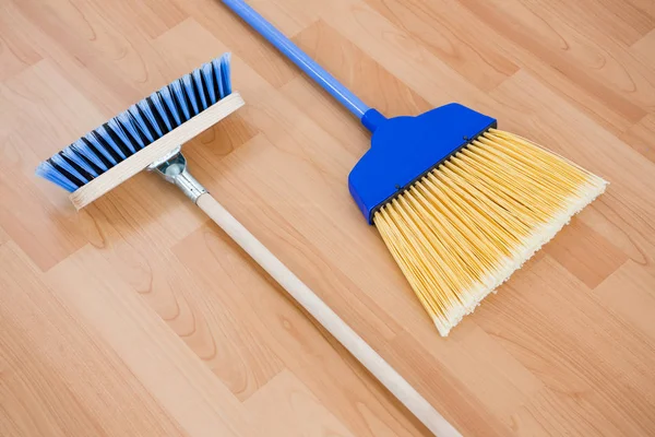 Close up of long handle brooms — Stock Photo, Image