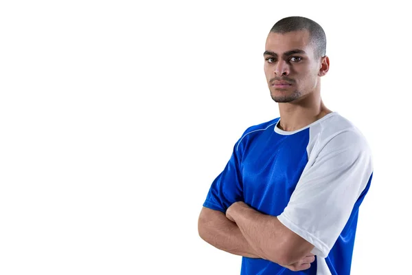 Football player standing with arms crossed — Stock Photo, Image