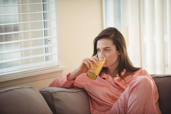 Woman drinking juice — Stock Photo, Image
