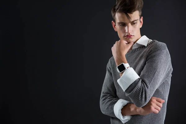 Androgynous man posing with hand on chin — Stock Photo, Image