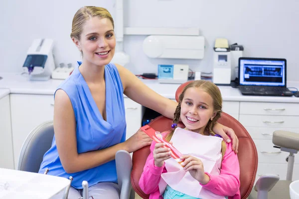 stock image mother and daughter at dental clinic