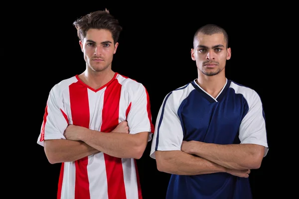 Two football players with arms crossed — Stock Photo, Image