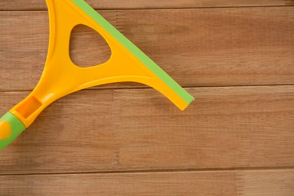 Cropped image of wiper on table — Stock Photo, Image