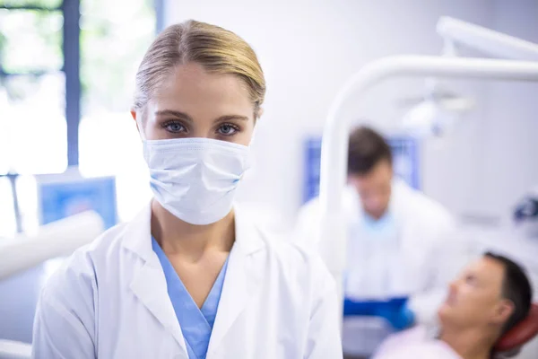 Dentist wearing surgical mask — Stock Photo, Image