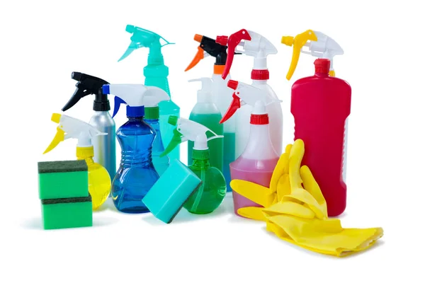 Colorful spray bottles with sponges and gloves — Stock Photo, Image