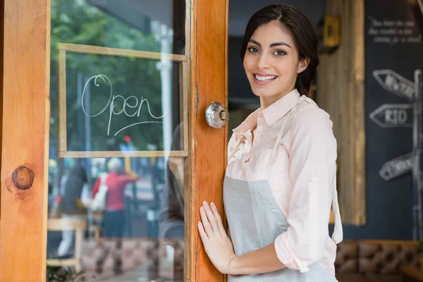 Waitress standing at the entrance — Stock Photo, Image