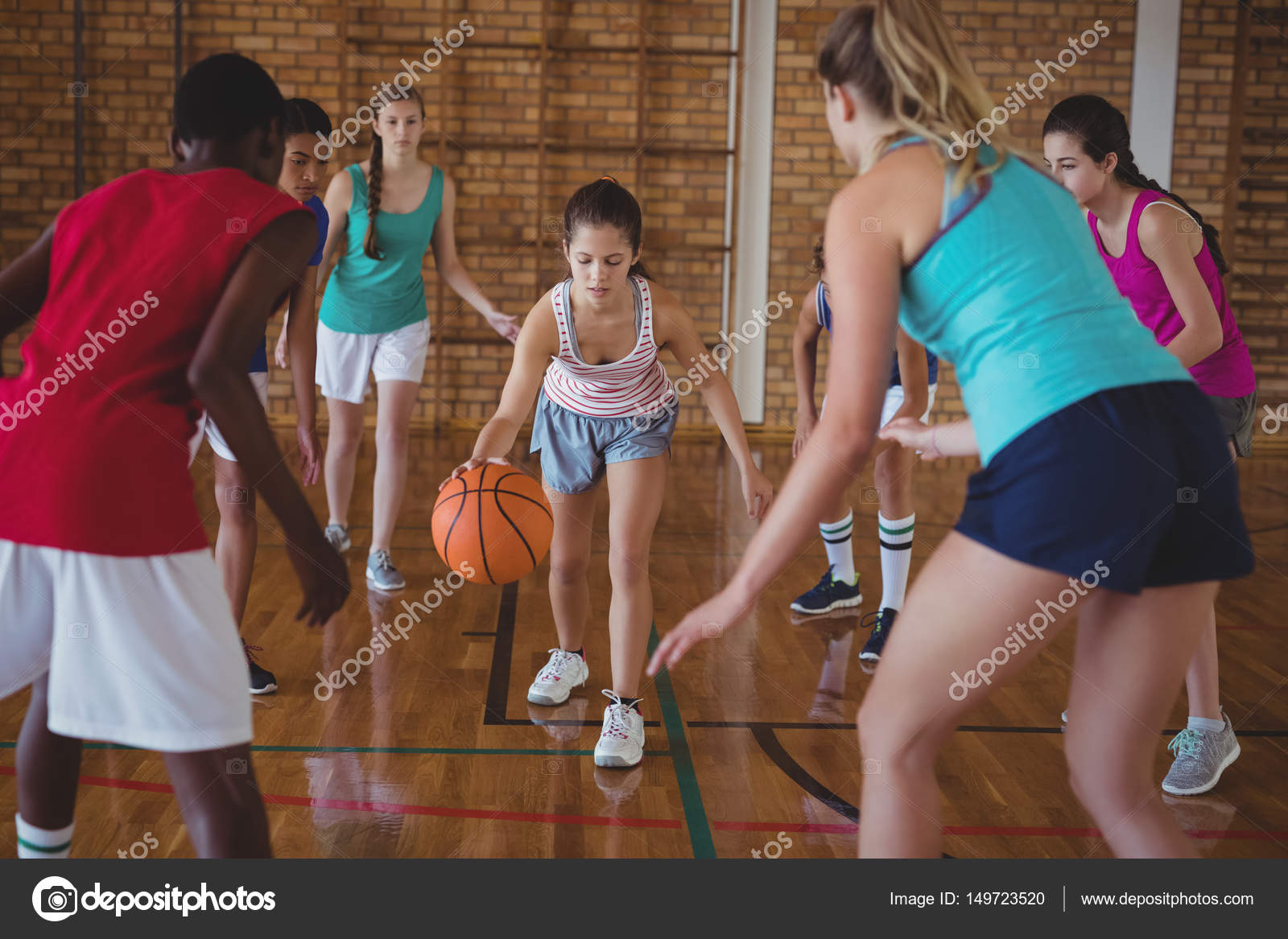 High School Kids Playing Basketball In Ourt Stock Photo