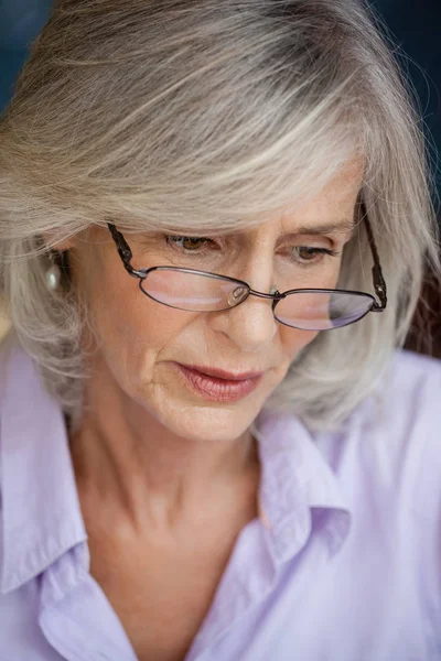 Close up of worried senior woman — Stock Photo, Image