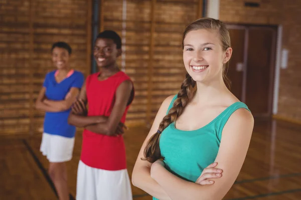 High school kids standing with arms crossed — Stock Photo, Image