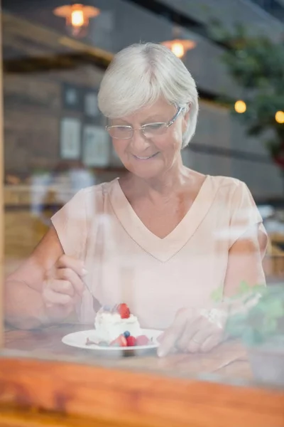 Senior woman having breakfast — Stock Photo, Image