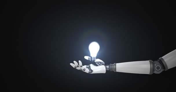 Robotic hand presenting illuminated bulb — Stock Video