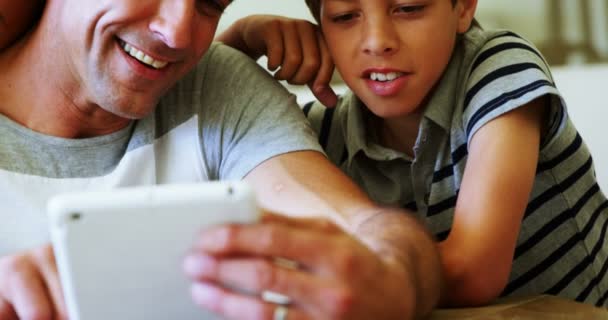 Father and kids using digital tablet — Stock Video