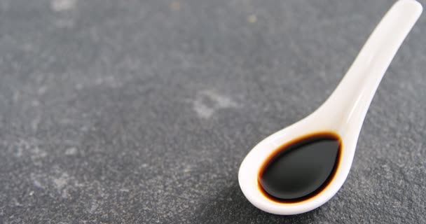 Close-up of chopsticks and soy sauce — Stock Video