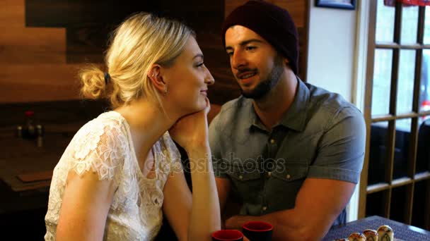 Couple interacting with each other in restaurant — Stock Video