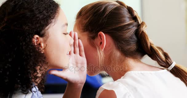 Students gossiping during class — Stock Video