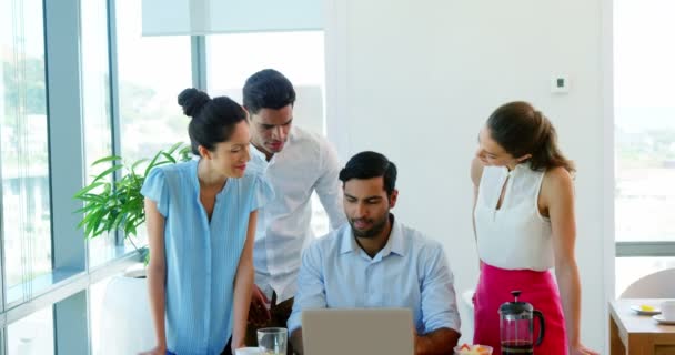 Executives discussing over laptop — Stock Video