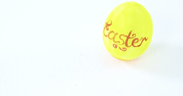 Easter text written on egg — Stock Video