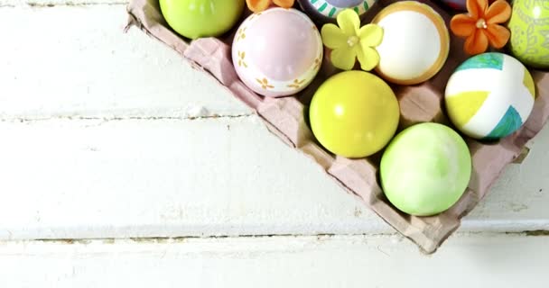 Painted Easter eggs in the nest — Stock Video